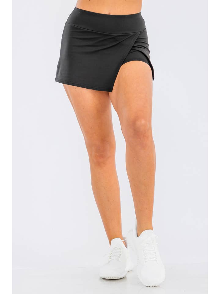 40954cb81aff4ffc6346afe6c04ecc24fb4646b80bf06348f5aabd5742a1dccf Wholesale Womens Athletic Mini Skort With Side Slit - Image 1